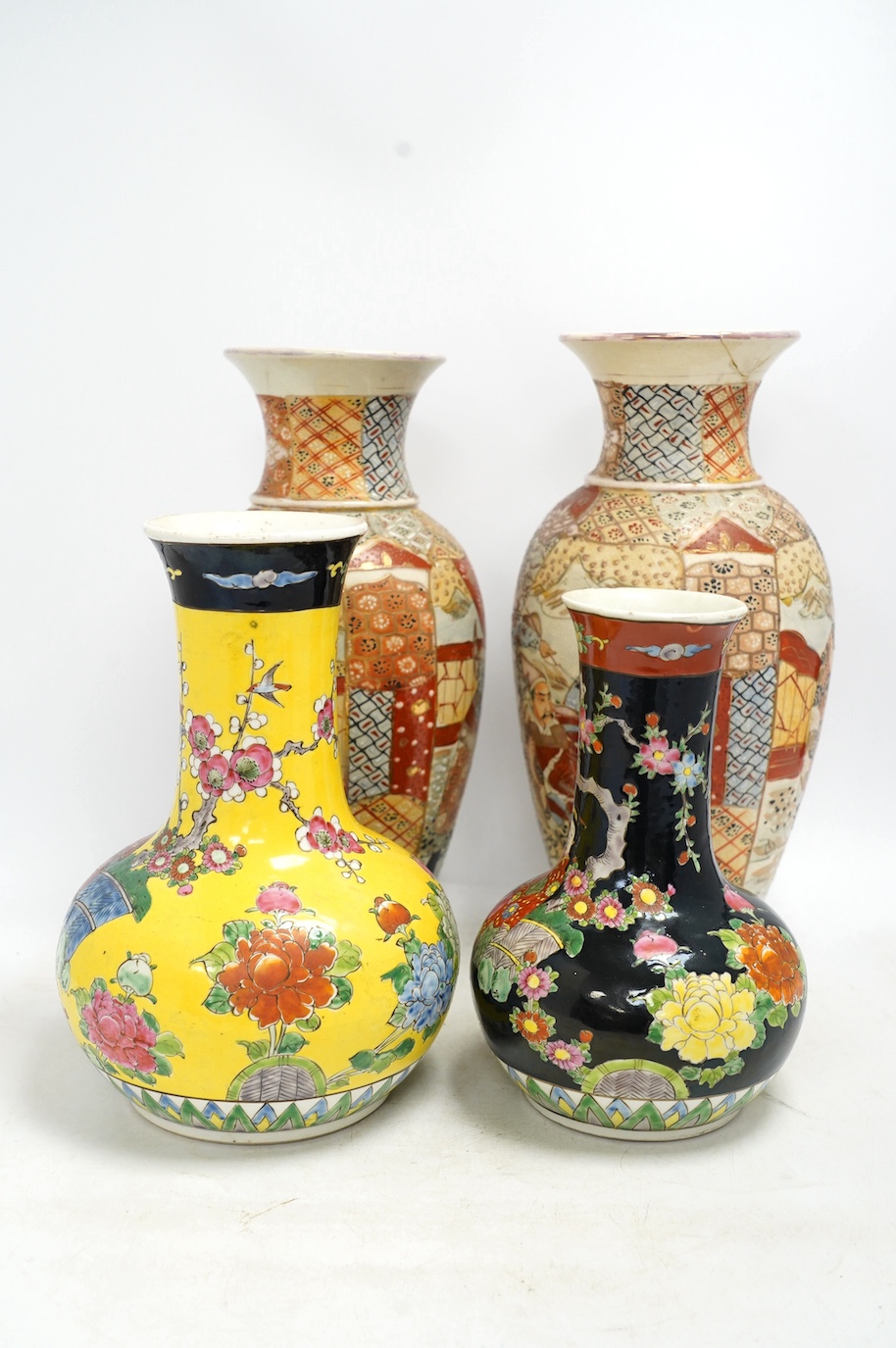 A pair of Japanese enamelled vases and a pair of brocaded Satsuma vases, tallest 32cm high., Condition - fair